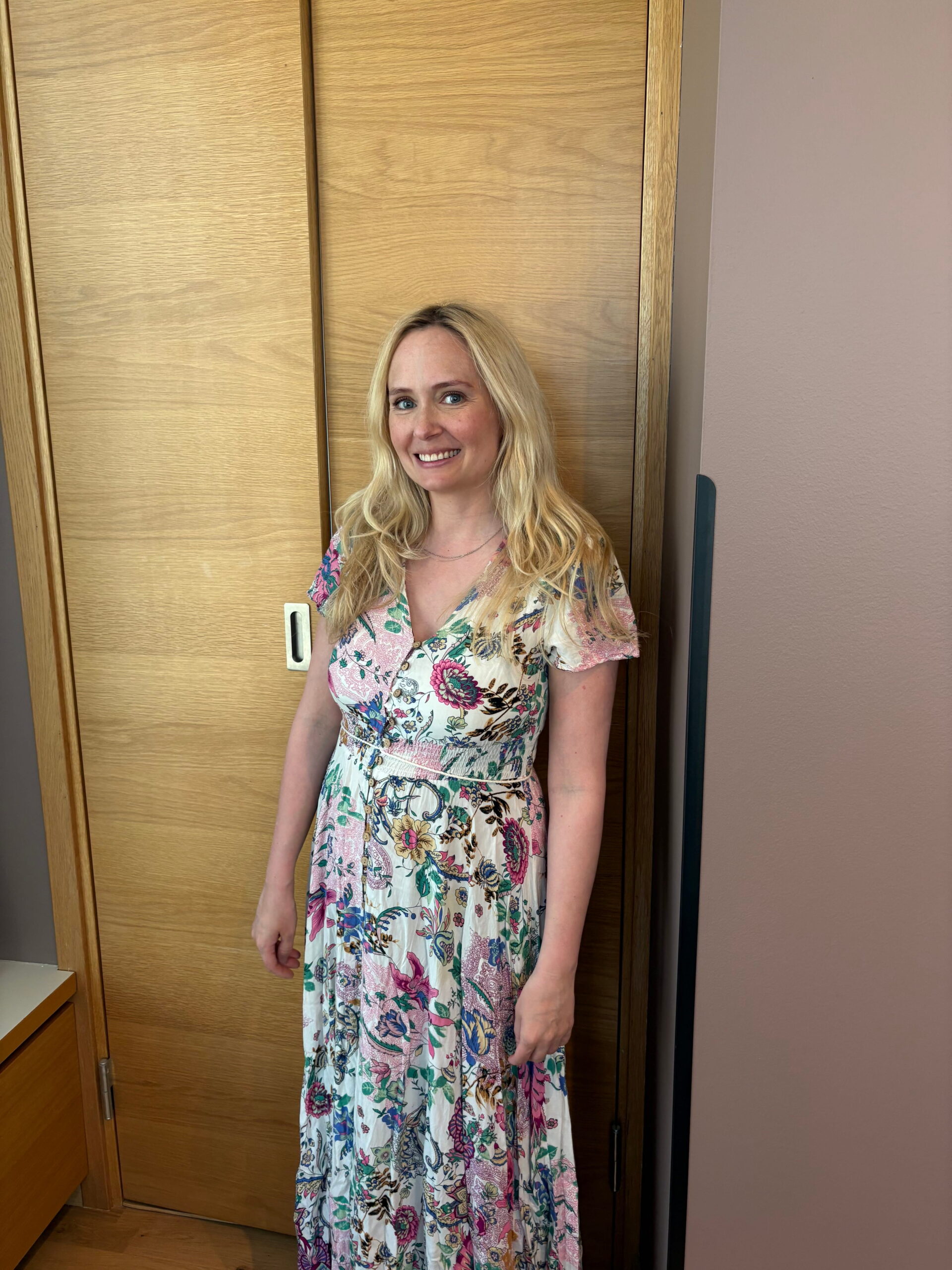 smiling linksandmaria in flower dress